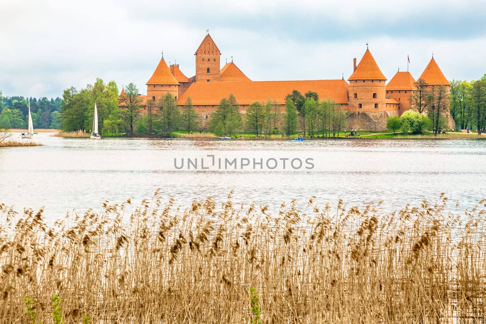 Panoramic view on Medieval old castle in Trakai, Lithuania placed on Galve lake..Island ancient castle are one of the most popular touristic destinations and cultural center in Lithuania.