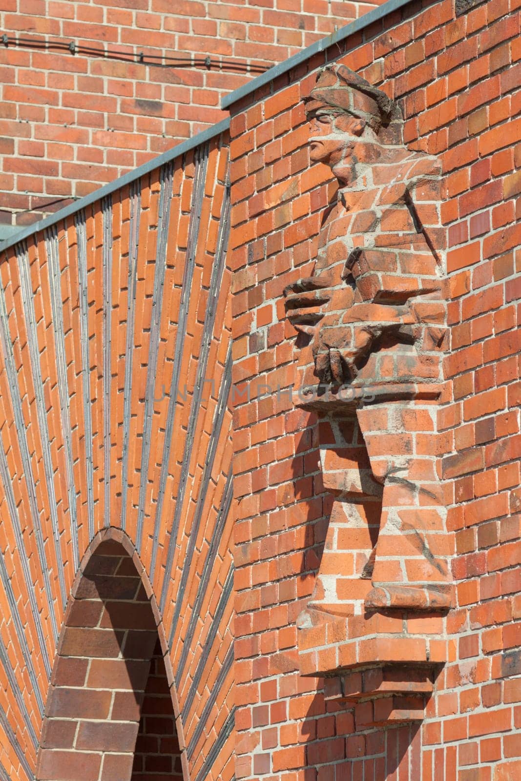 Workers' statue of bricks bricked at former company gate