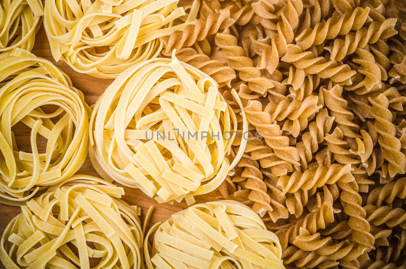Raw tagliatelle close-up background