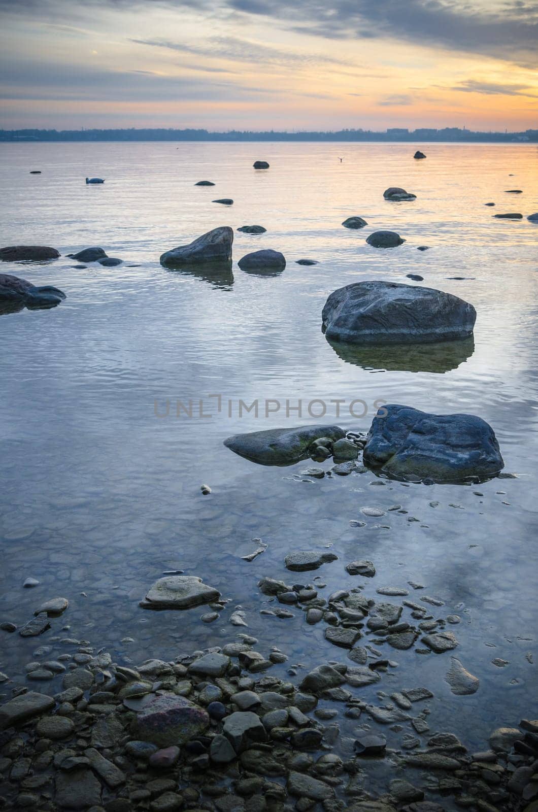 Beautiful sunrise on the sea. Views of Tallinn.