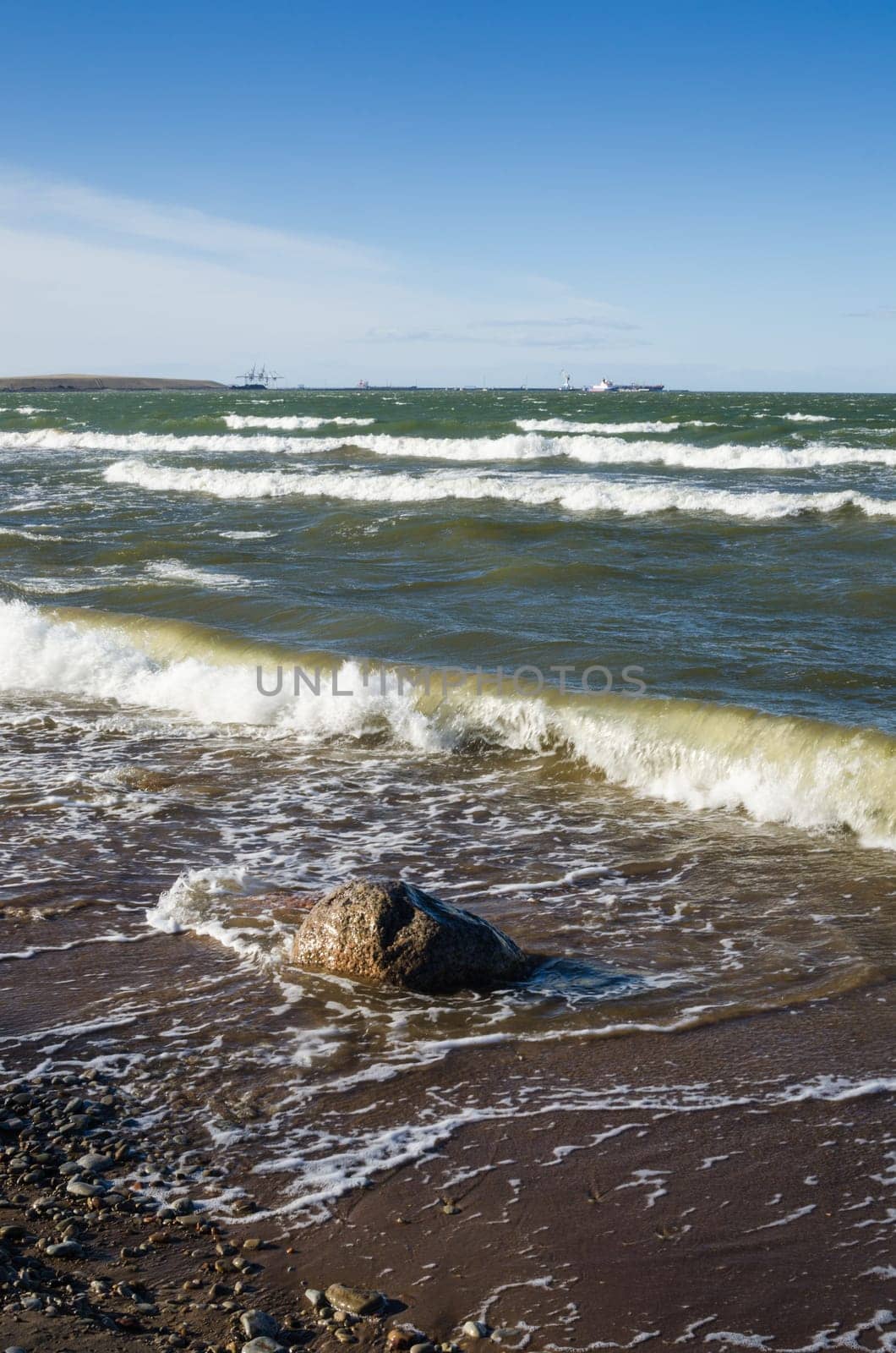 Sea waves lapping on the shore. Baltic Sea.