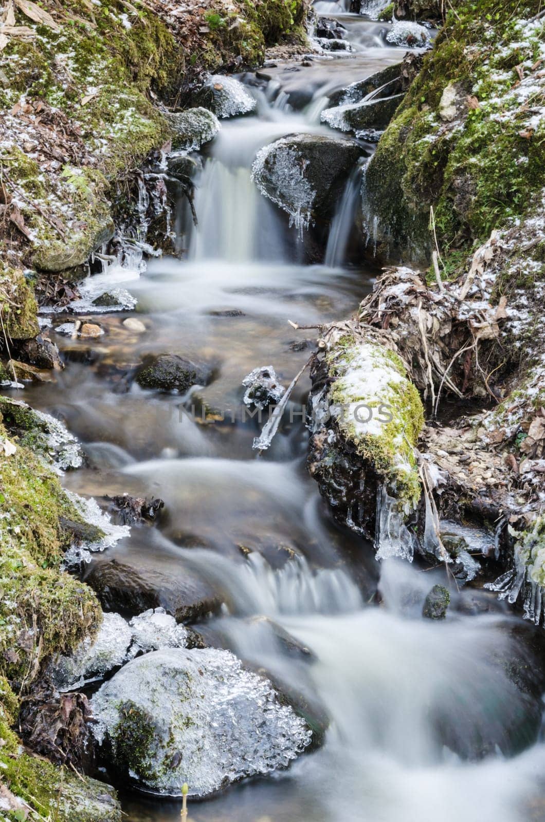 Small creek with a waterfall close up
