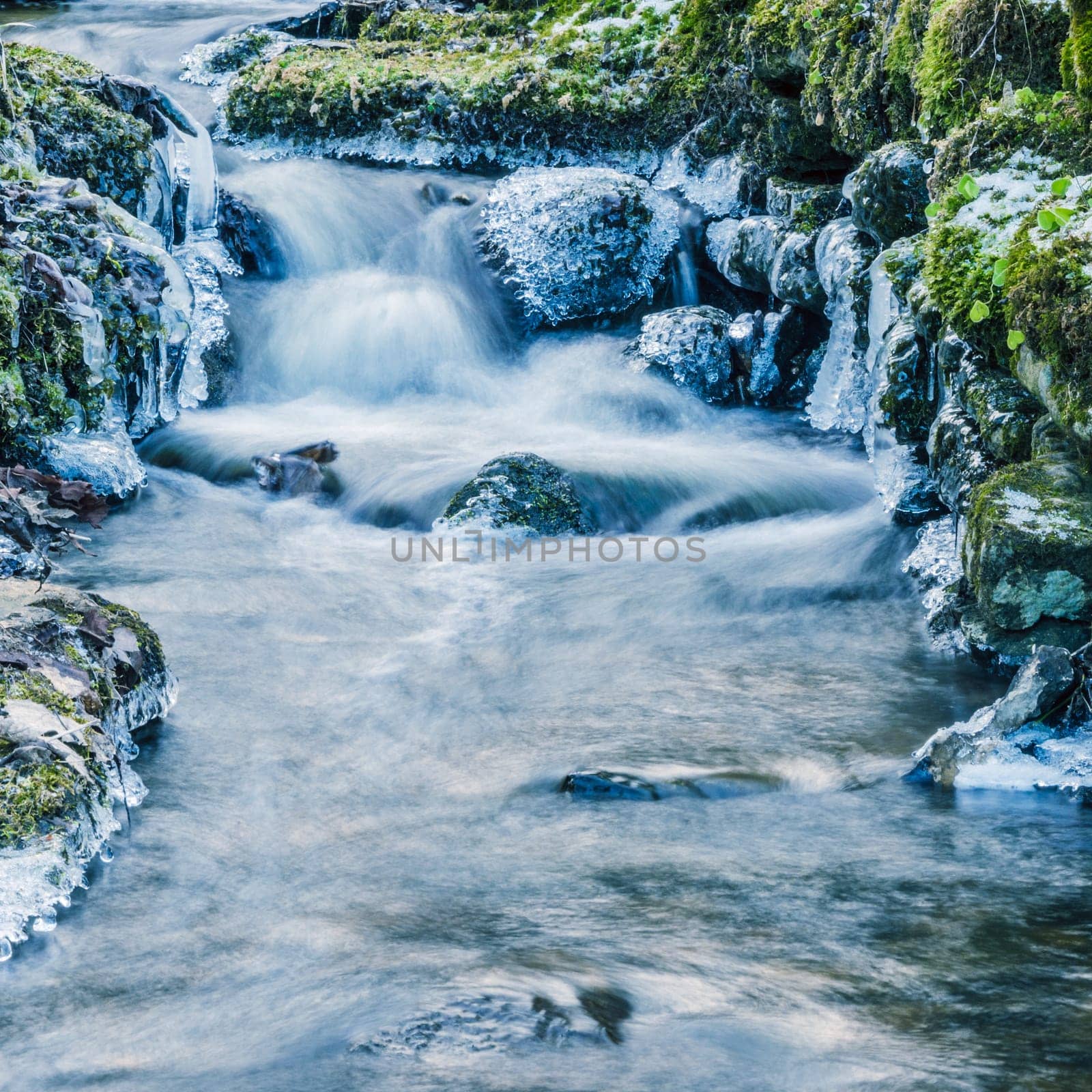 Small creek with a waterfall close up