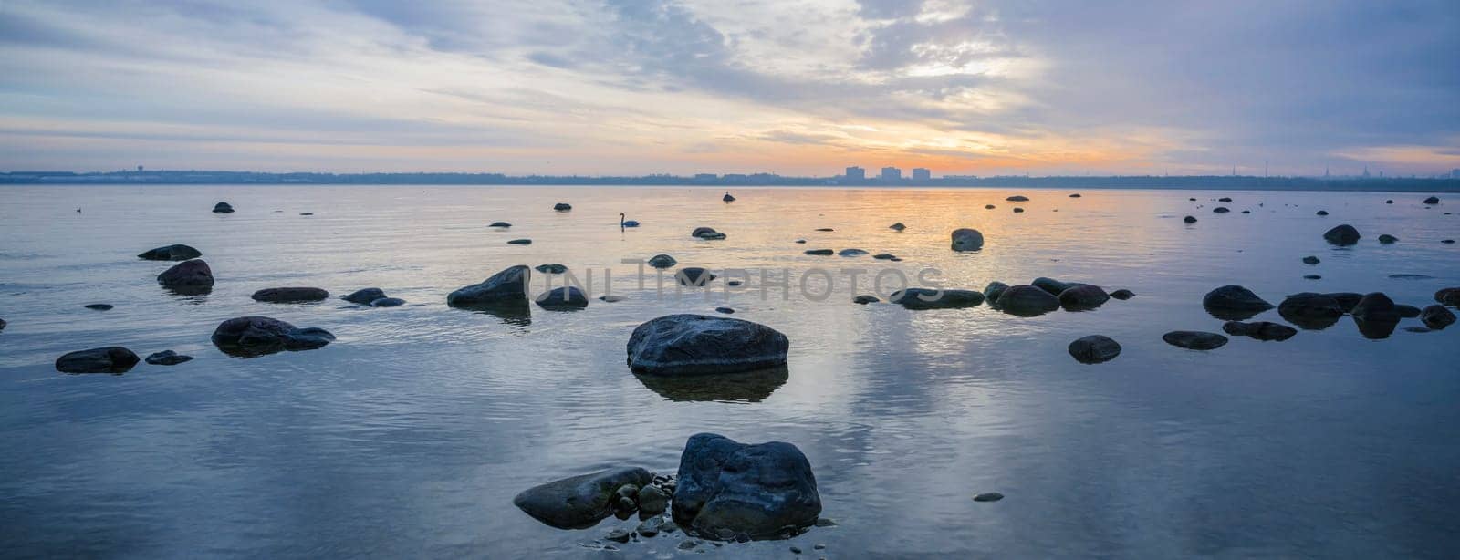 Beautiful sunrise on the sea. Views of Tallinn.