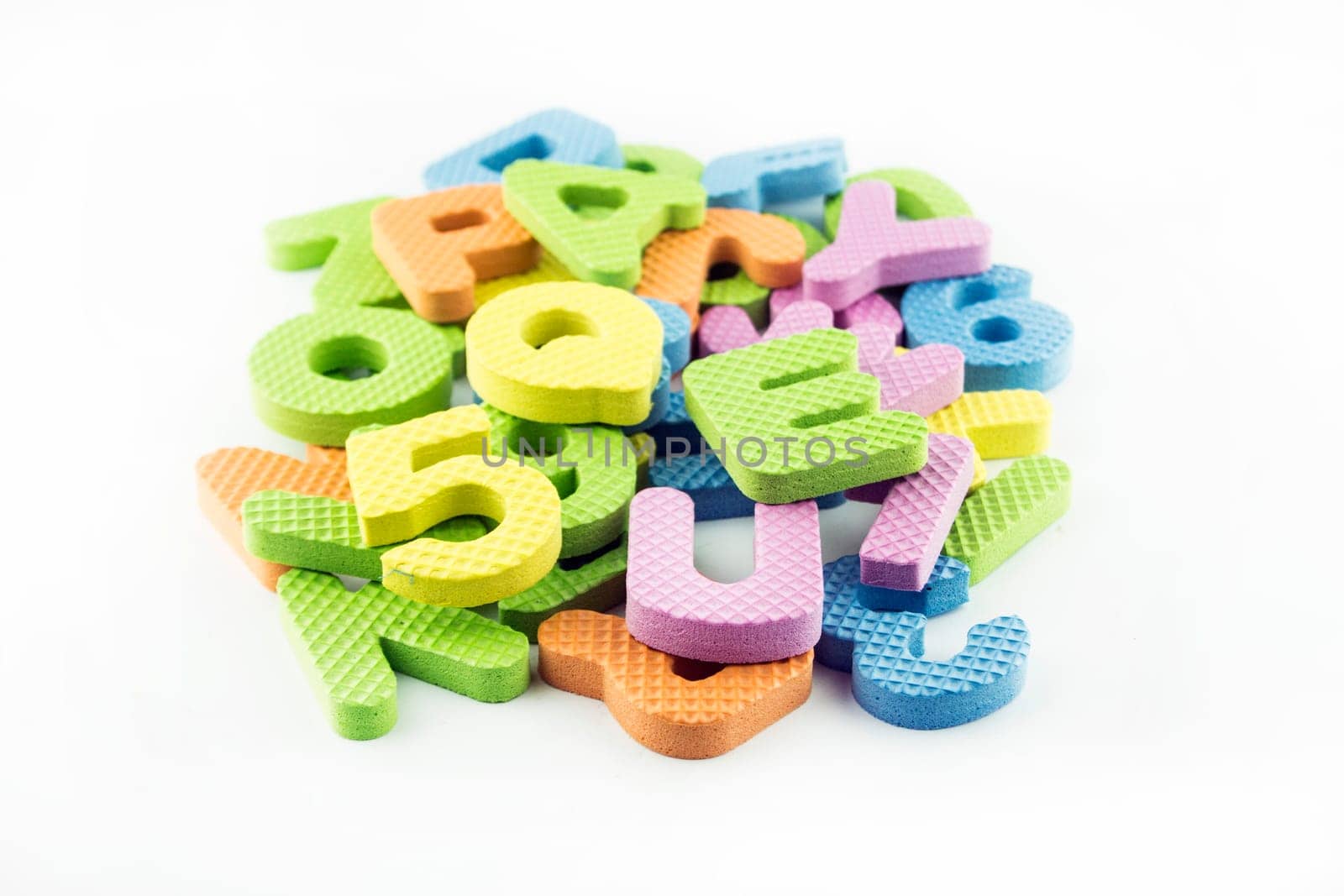 colorful alphabet letters on white background .