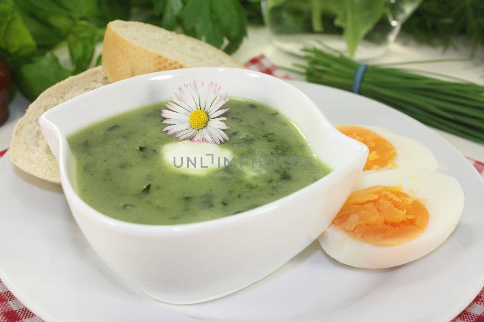 a green herb soup with eggs and creme Fraich