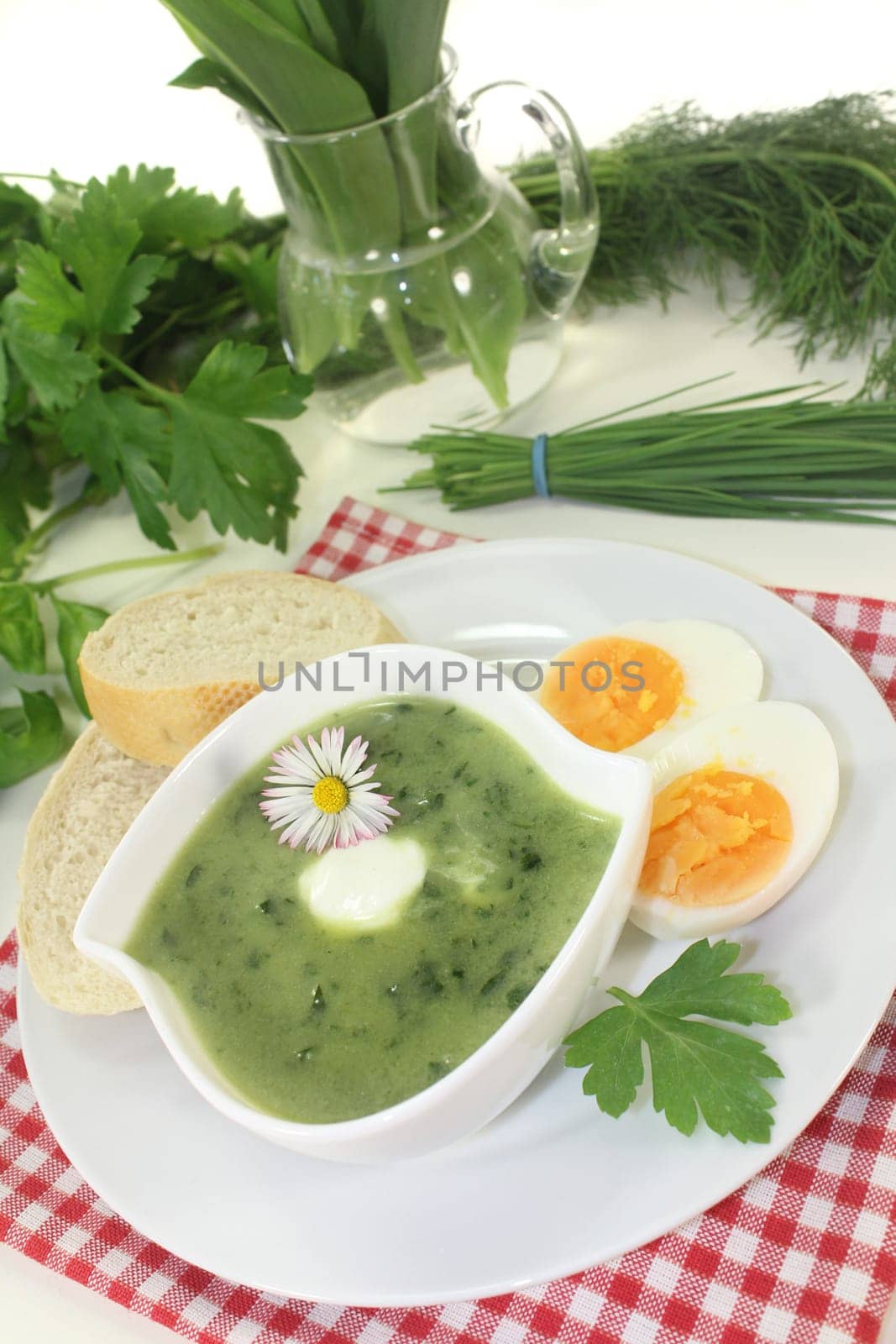 a green herb soup with eggs and creme Fraich