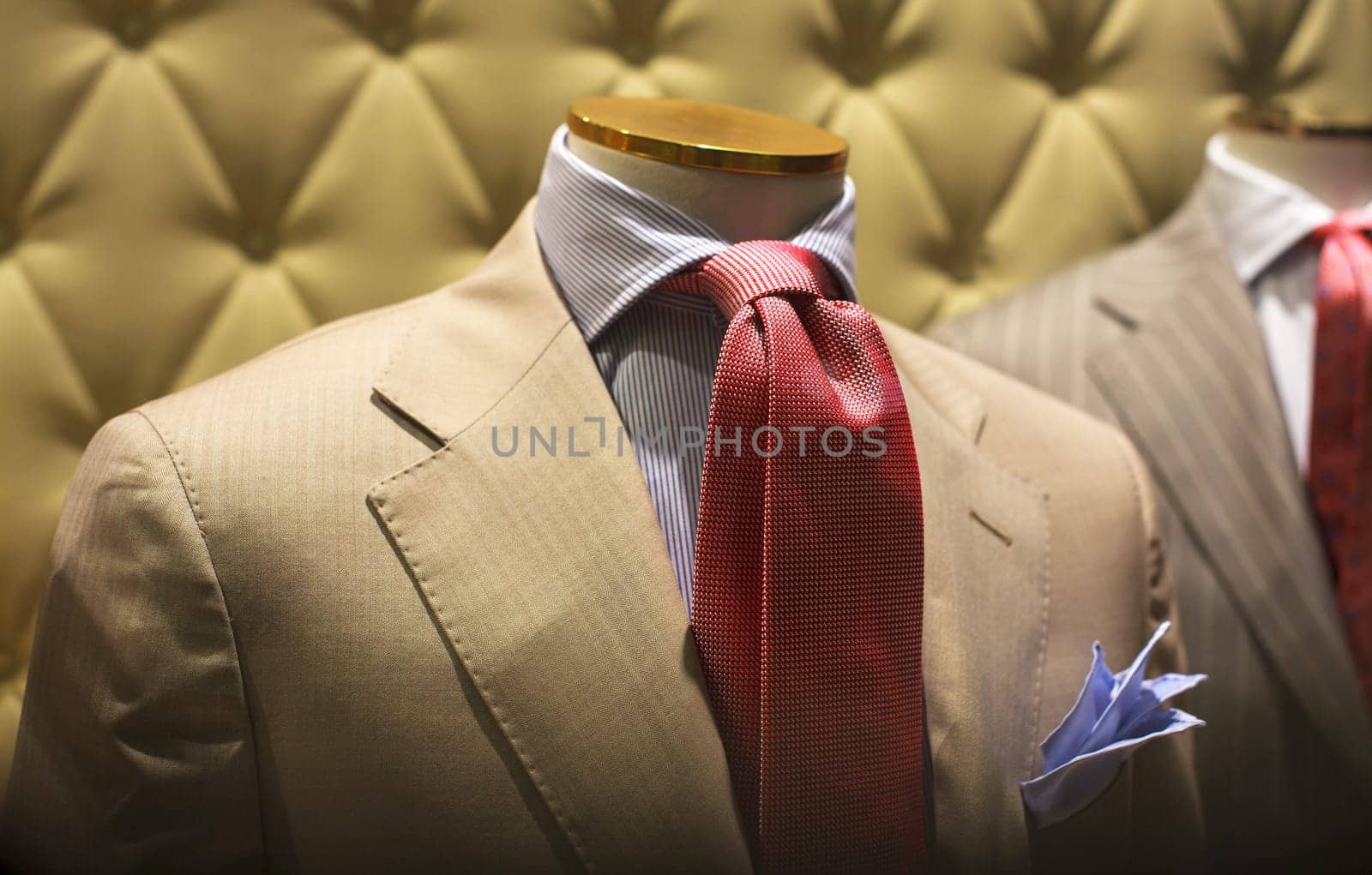 Business suits on shop mannequins high fashion retail display