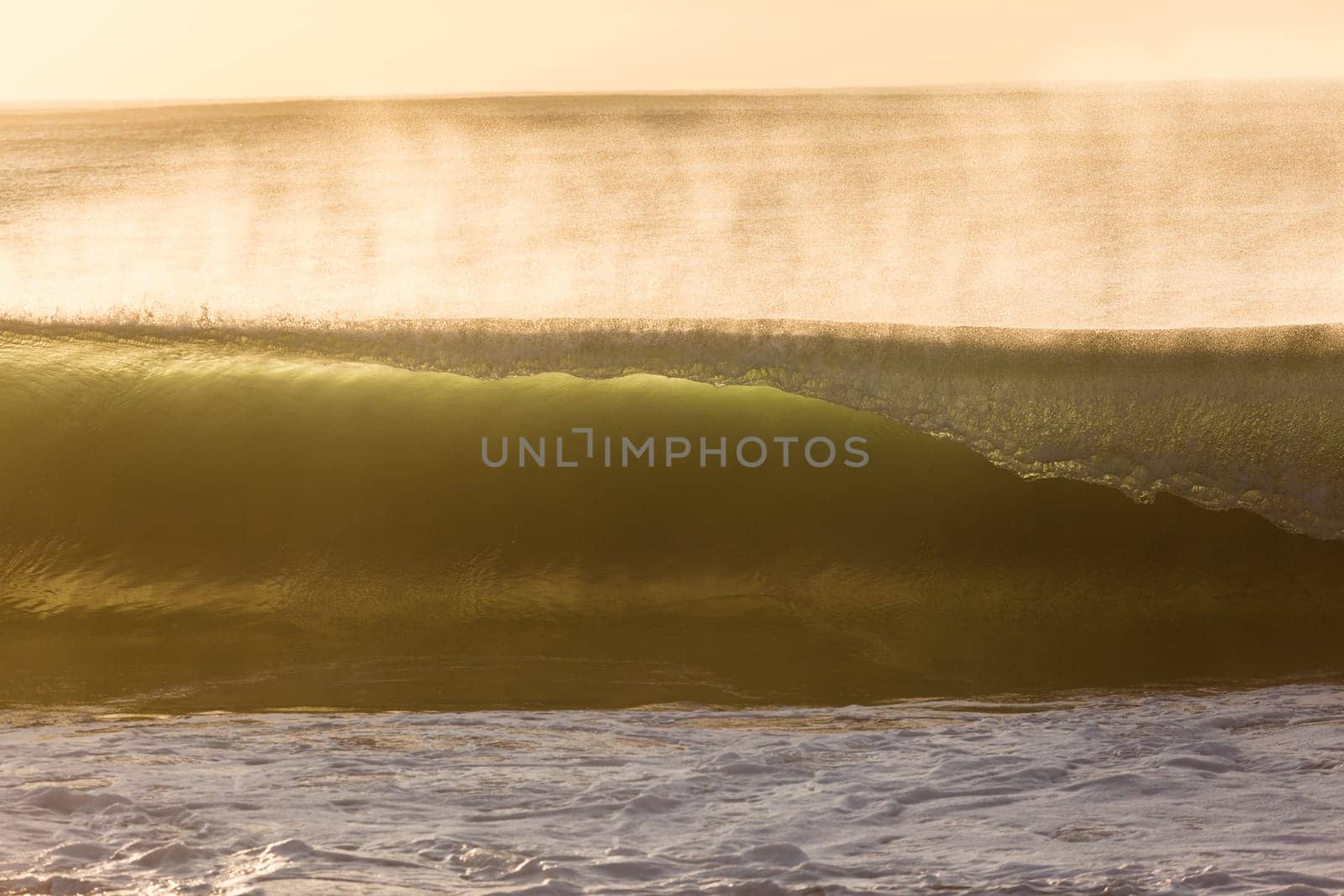 Ocean wave wall from storm swells crashing along shallow beach reef with natures  energy, a swimming photo of sea power.