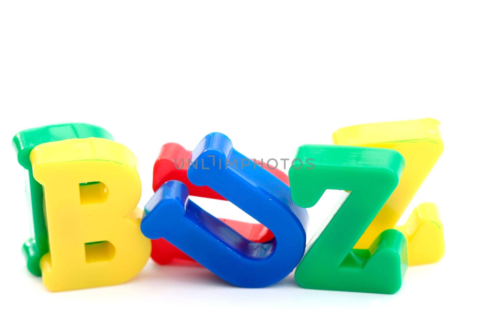 Close-up of letters. "Buzz"" word."