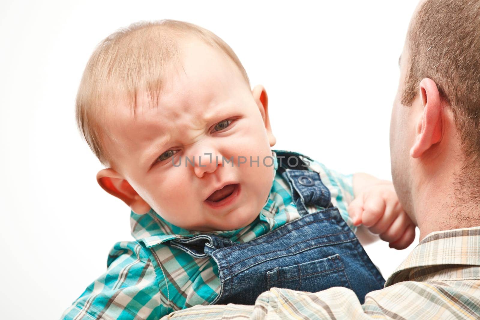 portrait of angry caucasian baby