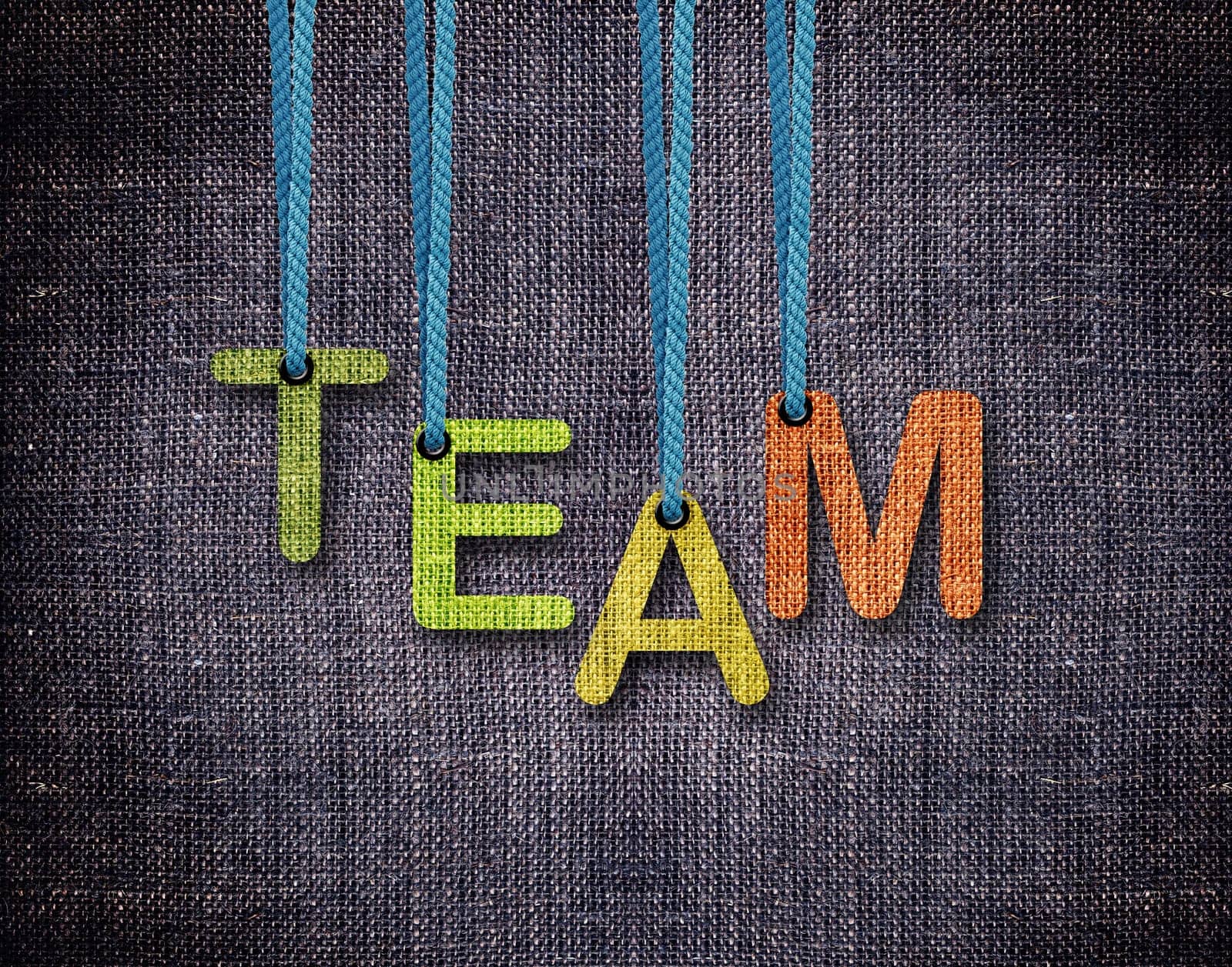 Team Letters hanging strings with blue sackcloth background.