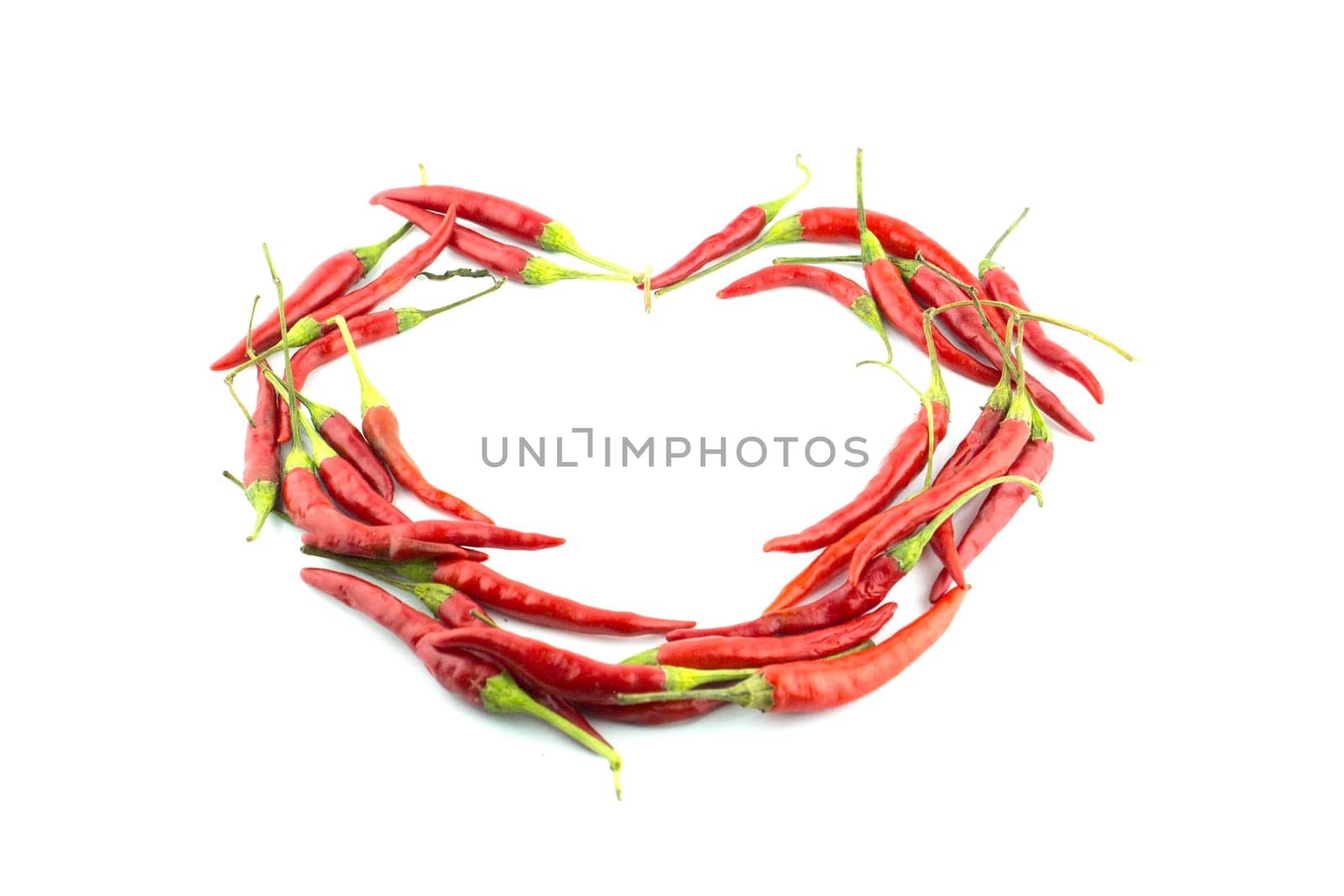 red hot chili pepper make love heart shape on a white background
