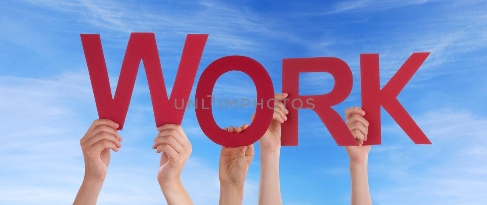 hands holding four pieces of a puzzle with copy space, gray background