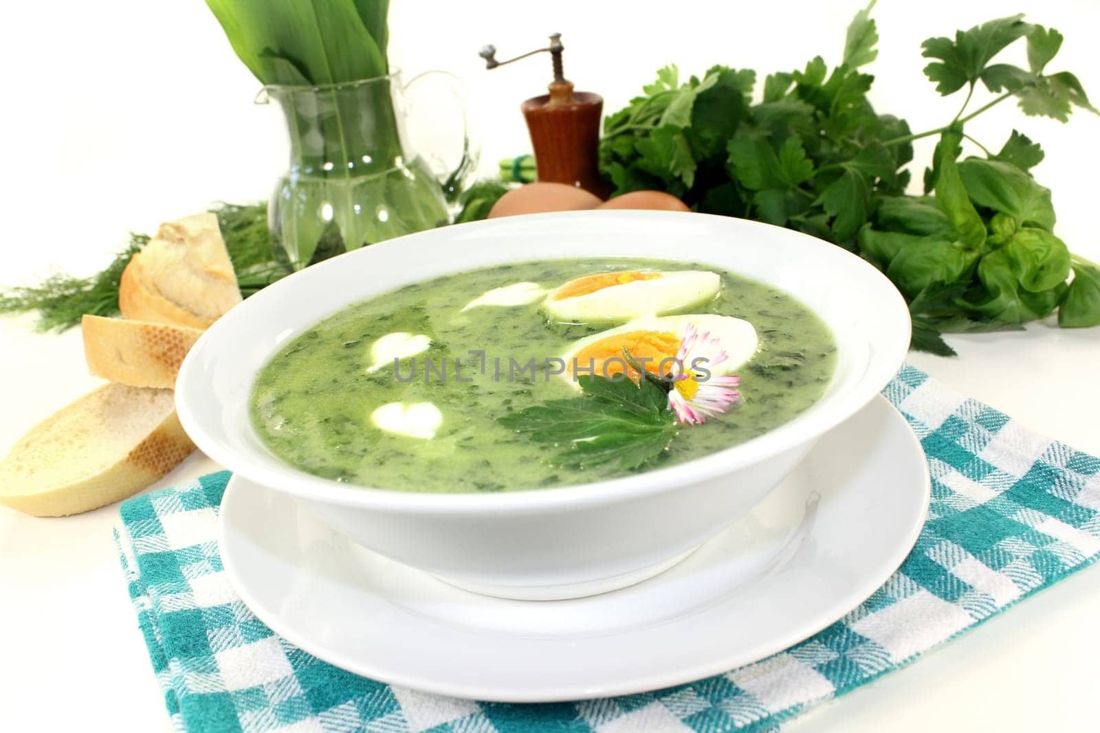 a green herb soup with eggs and creme Fraich