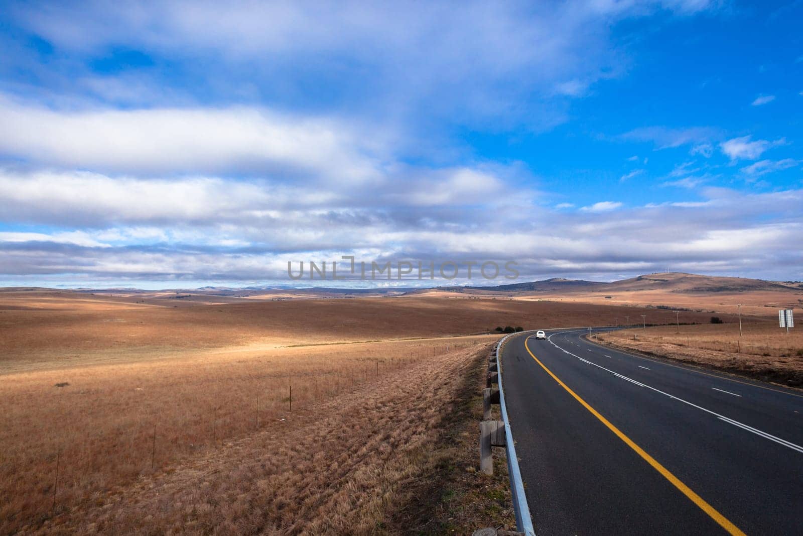 Road color scenic beauty contrast over rural countryside farming landscape