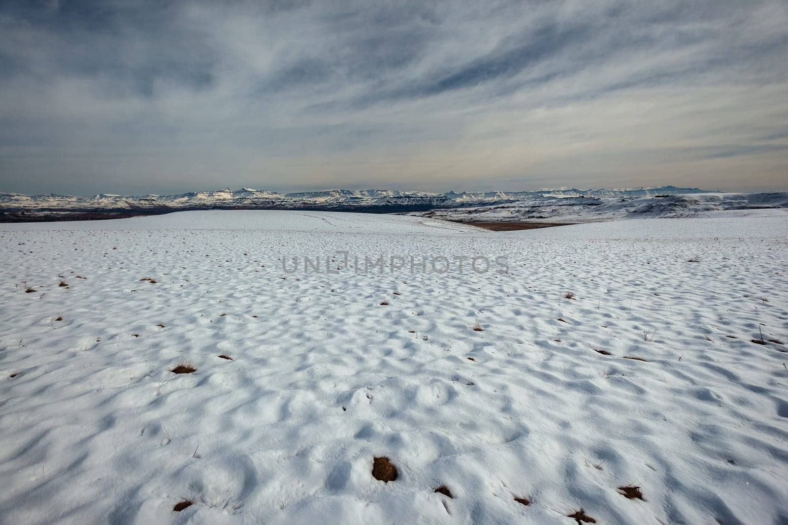 Mountains snow mist over rugged terrain scenic landscape