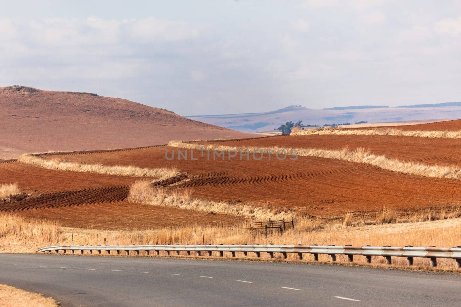 Road color scenic beauty contrast over rural countryside farming landscape