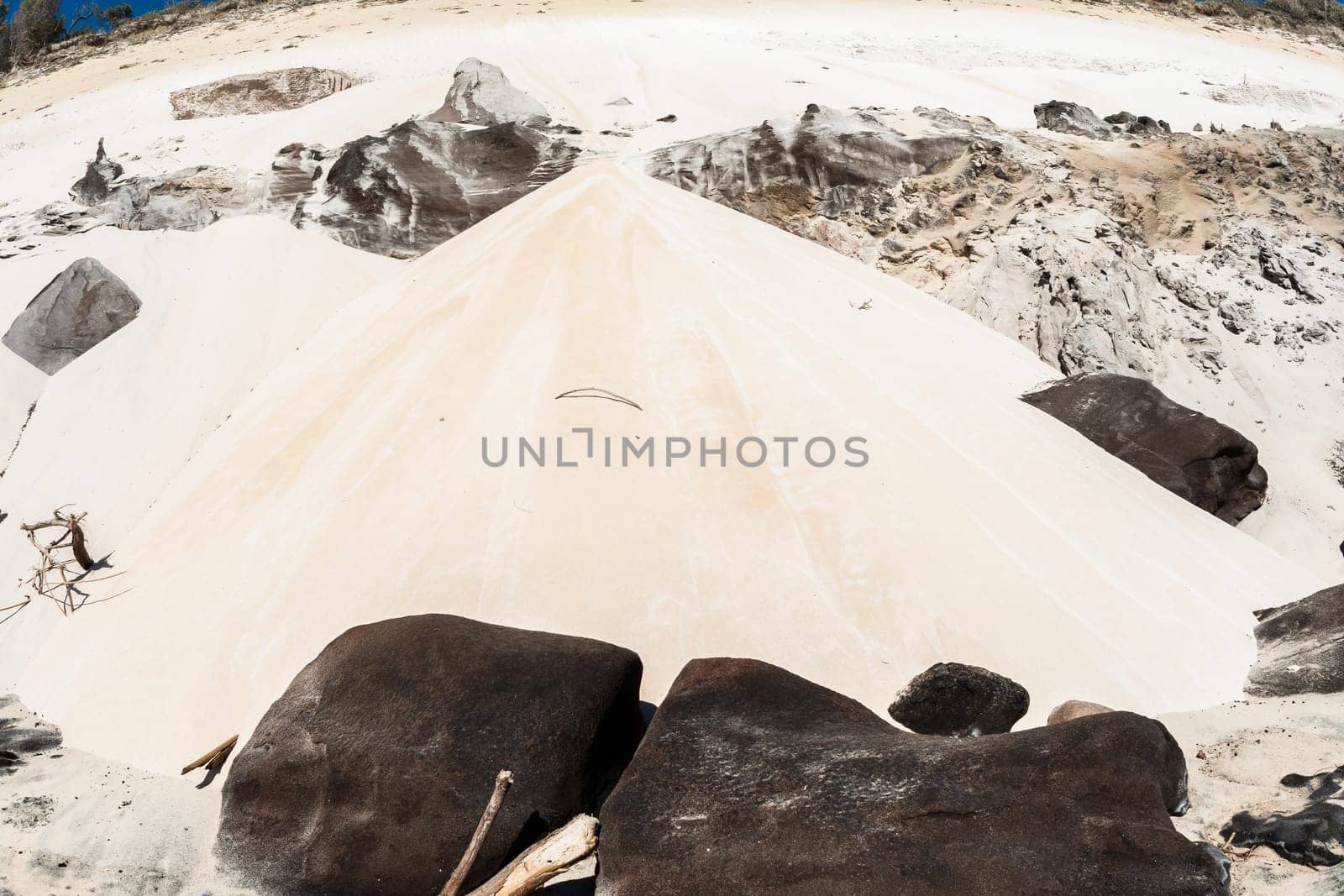 Rainbow beach color sands and rocks alongside ocean sea embankment