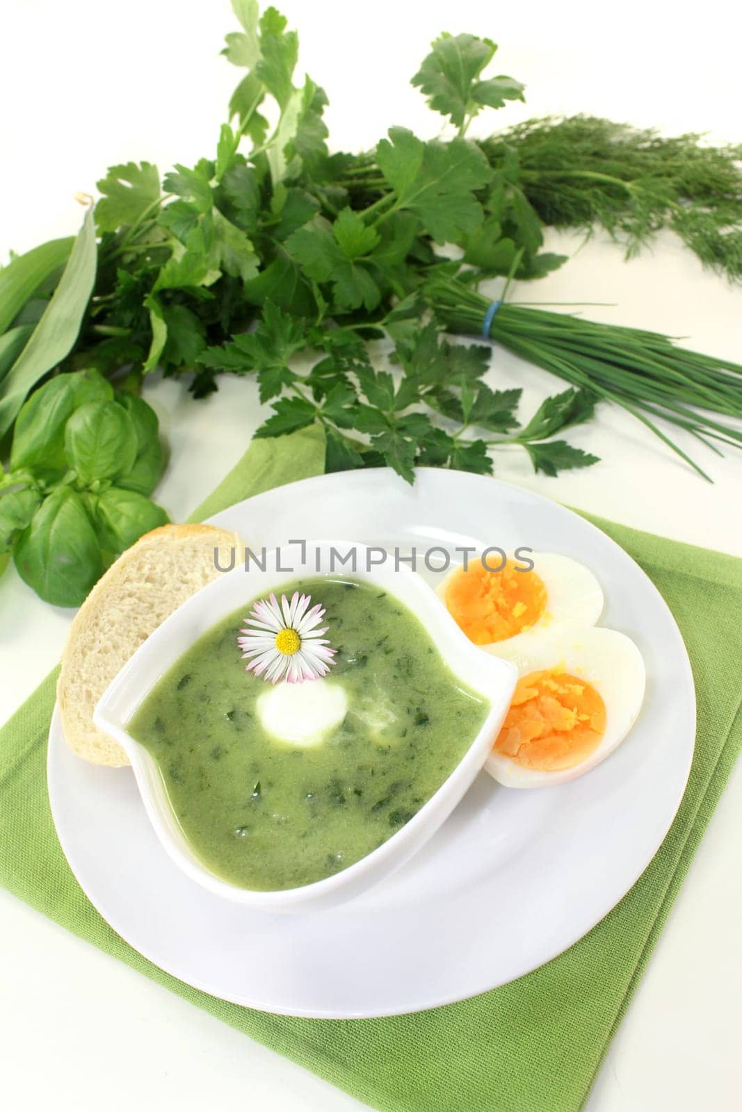 a green herb soup with eggs and creme Fraich