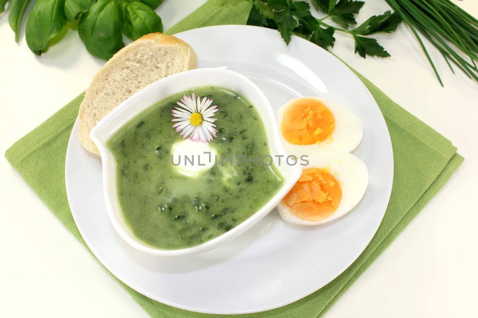 a green herb soup with eggs and creme Fraich
