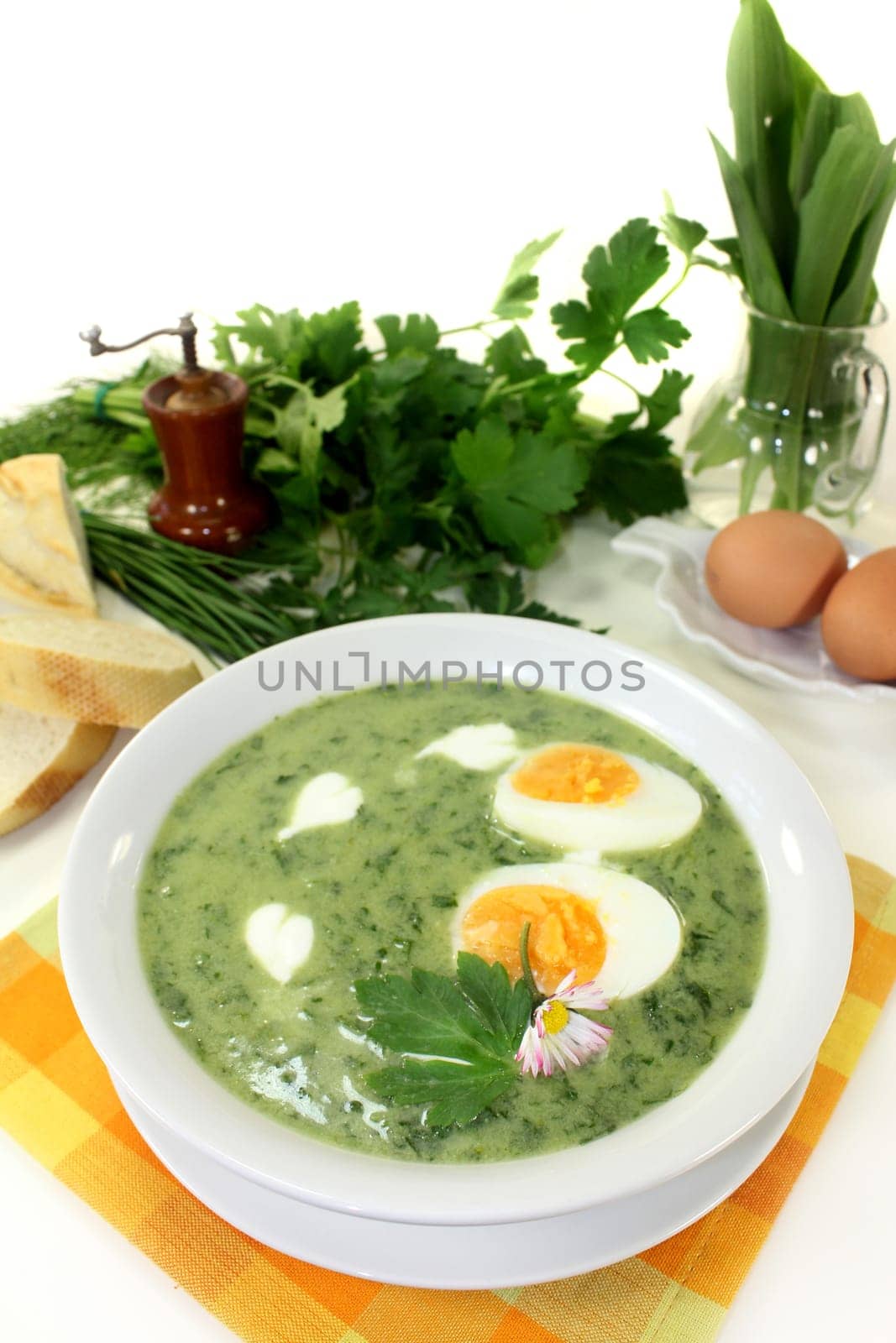 a green herb soup with eggs and creme Fraich