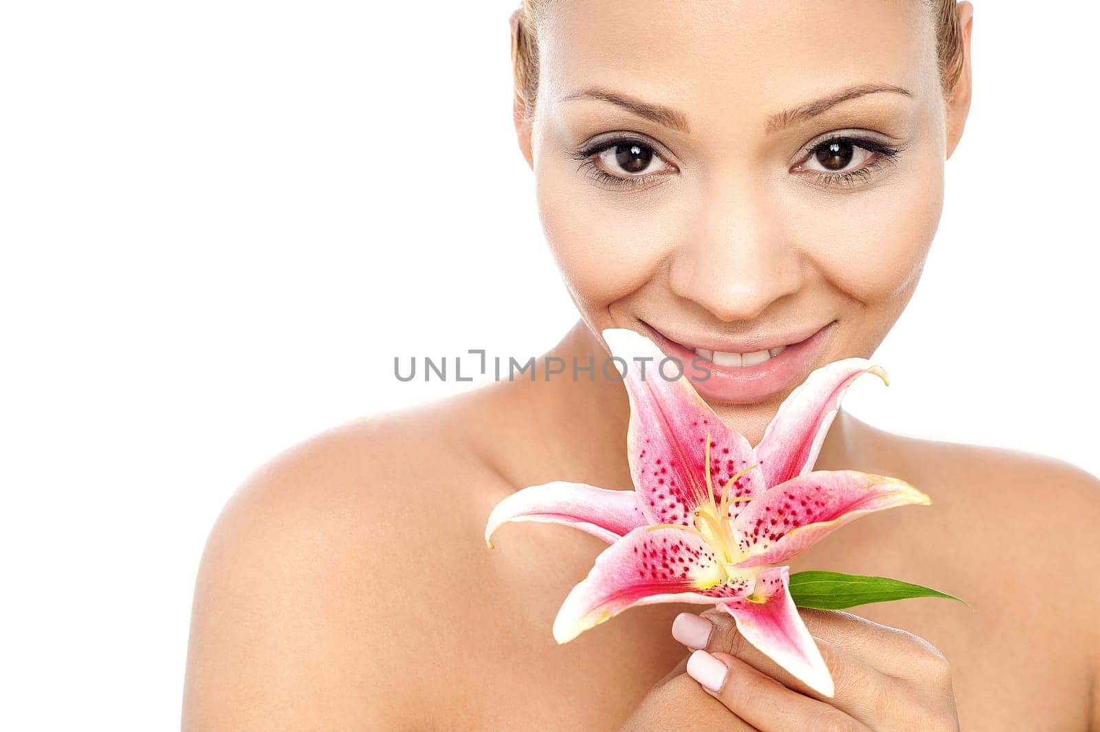 Charming lady holding lily flower