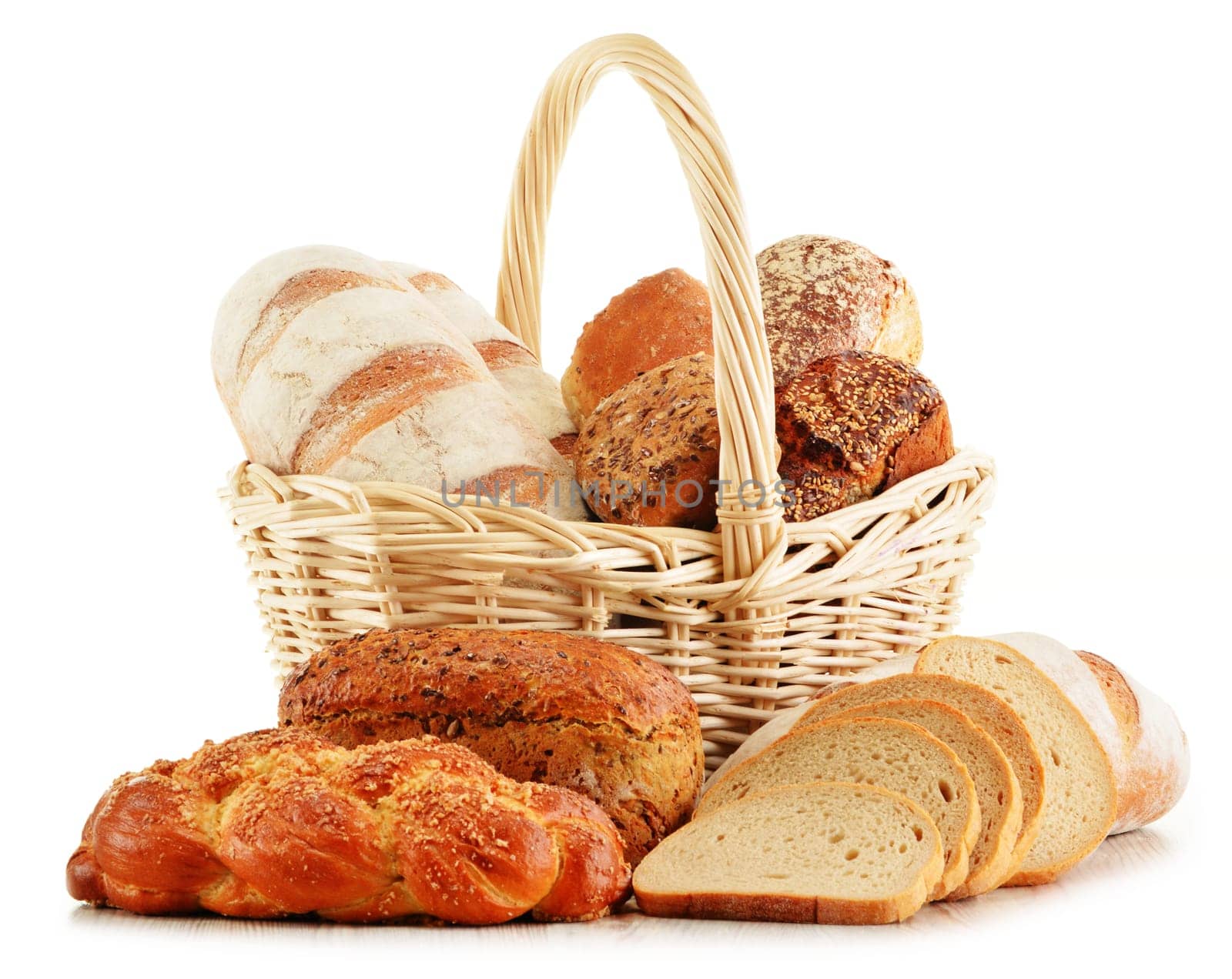 Wicker basket with baking products isolated on white