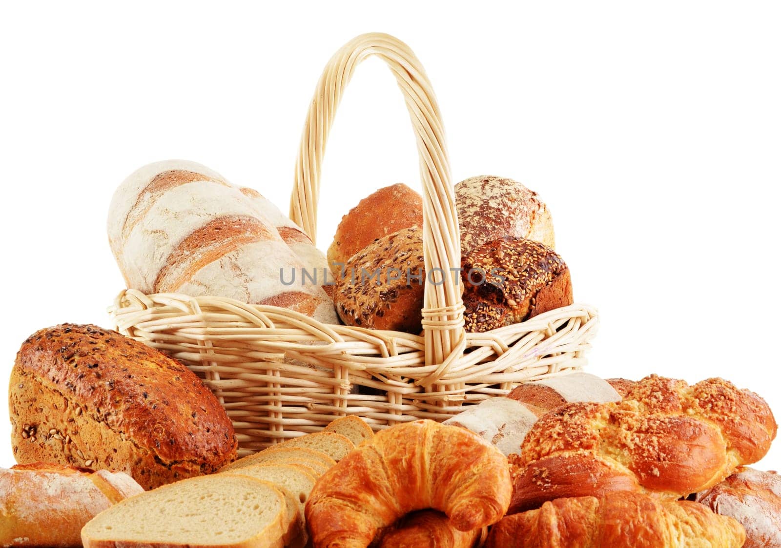 Wicker basket with baking products isolated on white