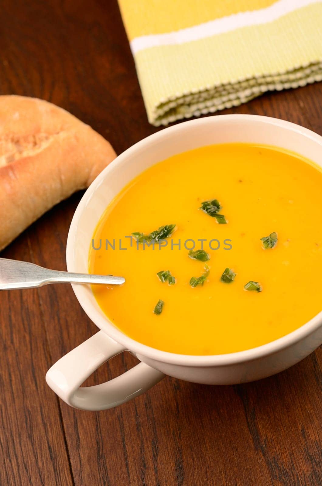 Hokkaido pumpkin cream soup on a kitchen table