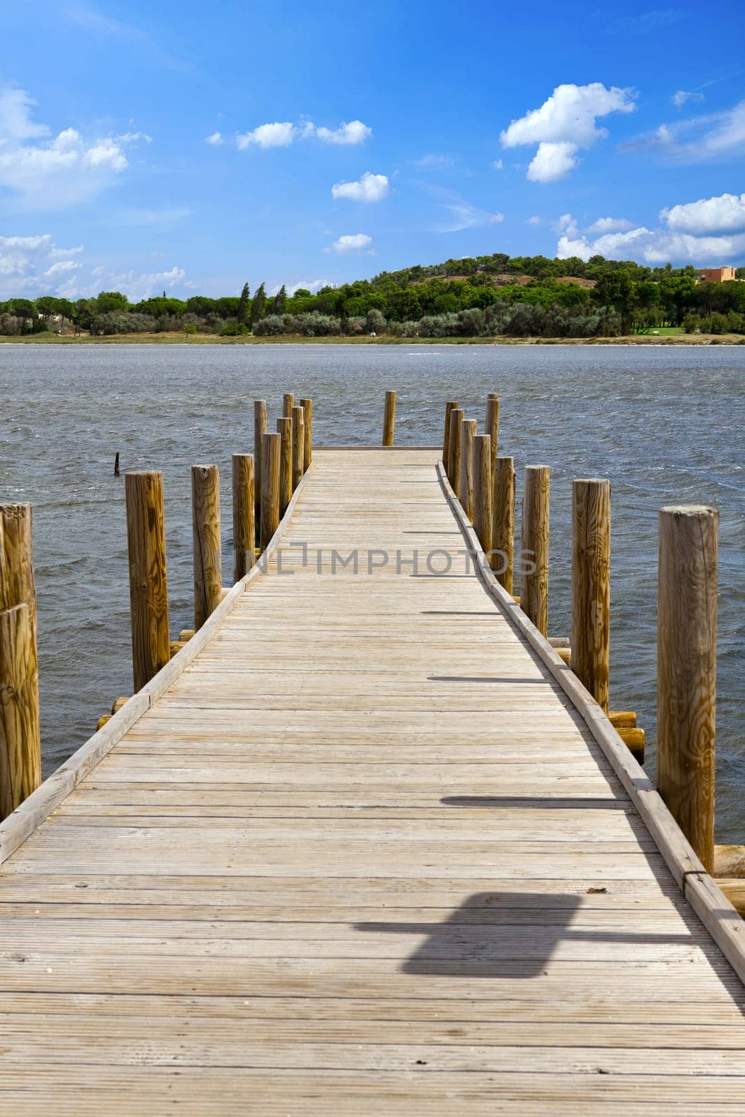 Wooden walkway in the water outside Gruissan