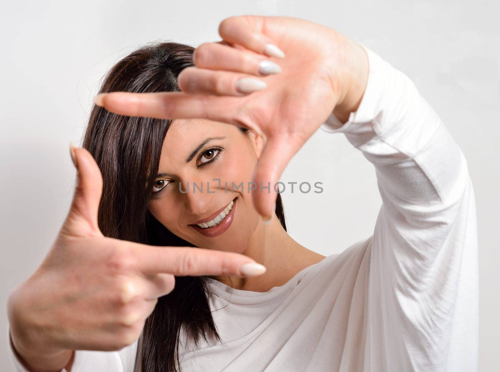 Portrait of a beautiful caucasian woman on a white background
