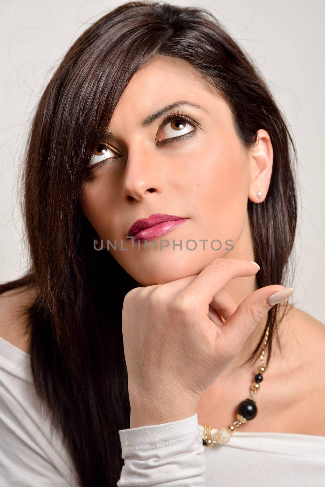 Portrait of a beautiful caucasian woman on a white background