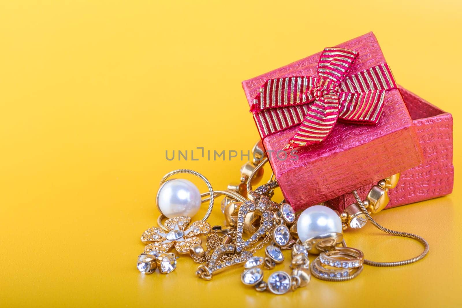 Jewelry gift box on yellow background