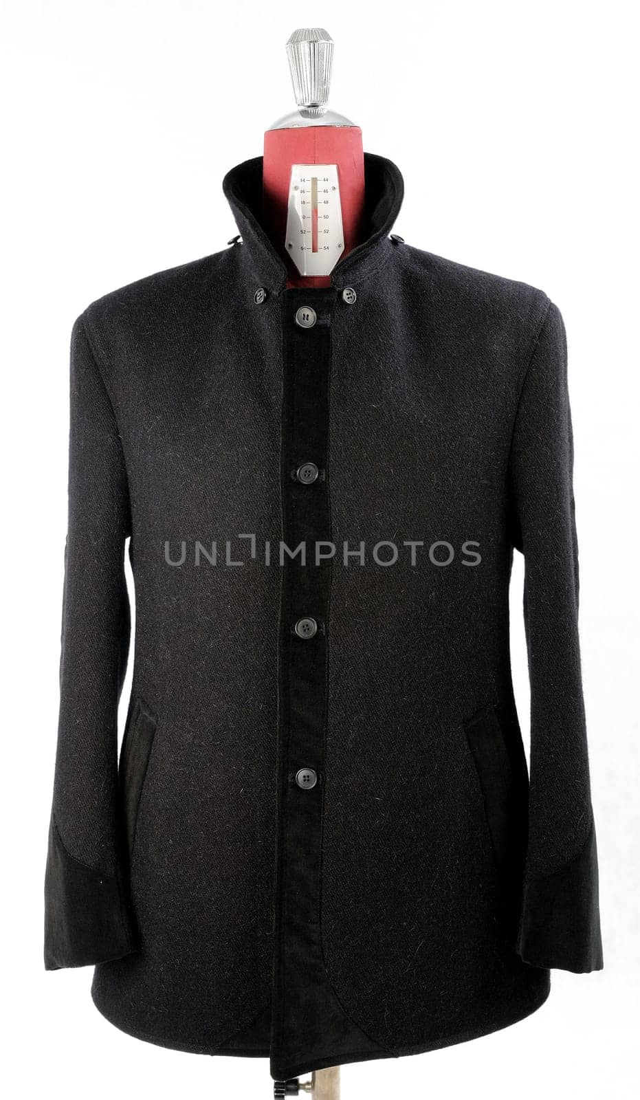 Woolen black coat, inserts and lining in velvet. Detachable hood.