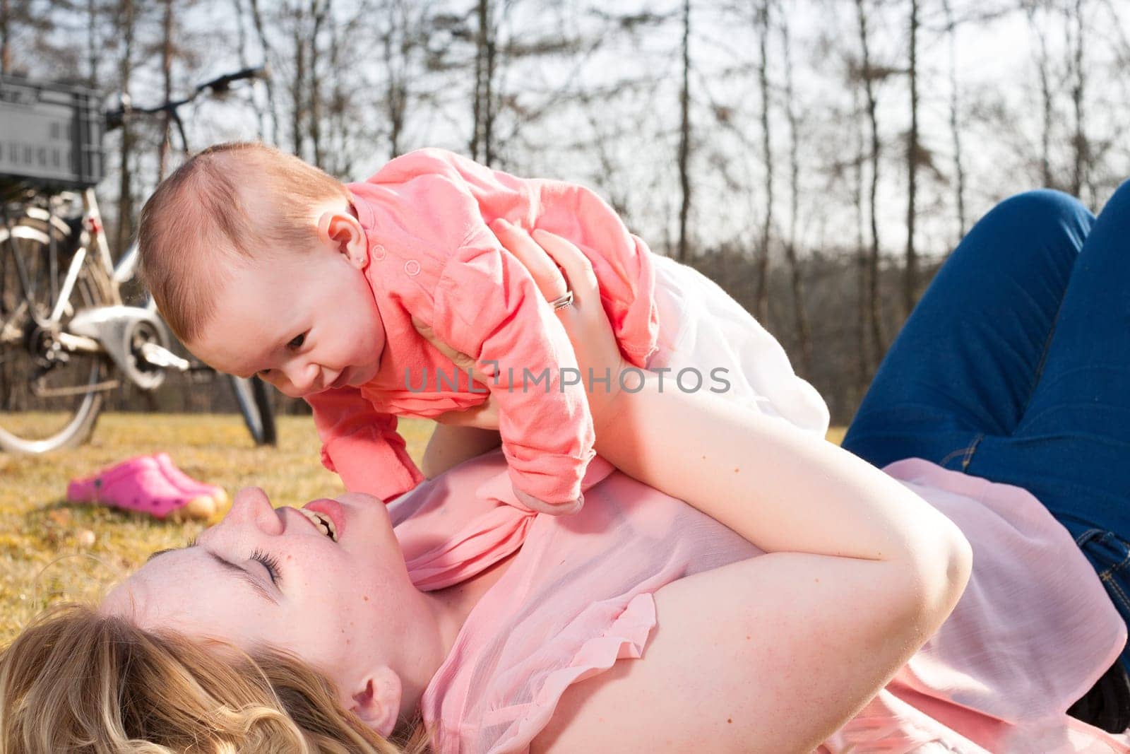 Mother and daughter on a sunny day in the field