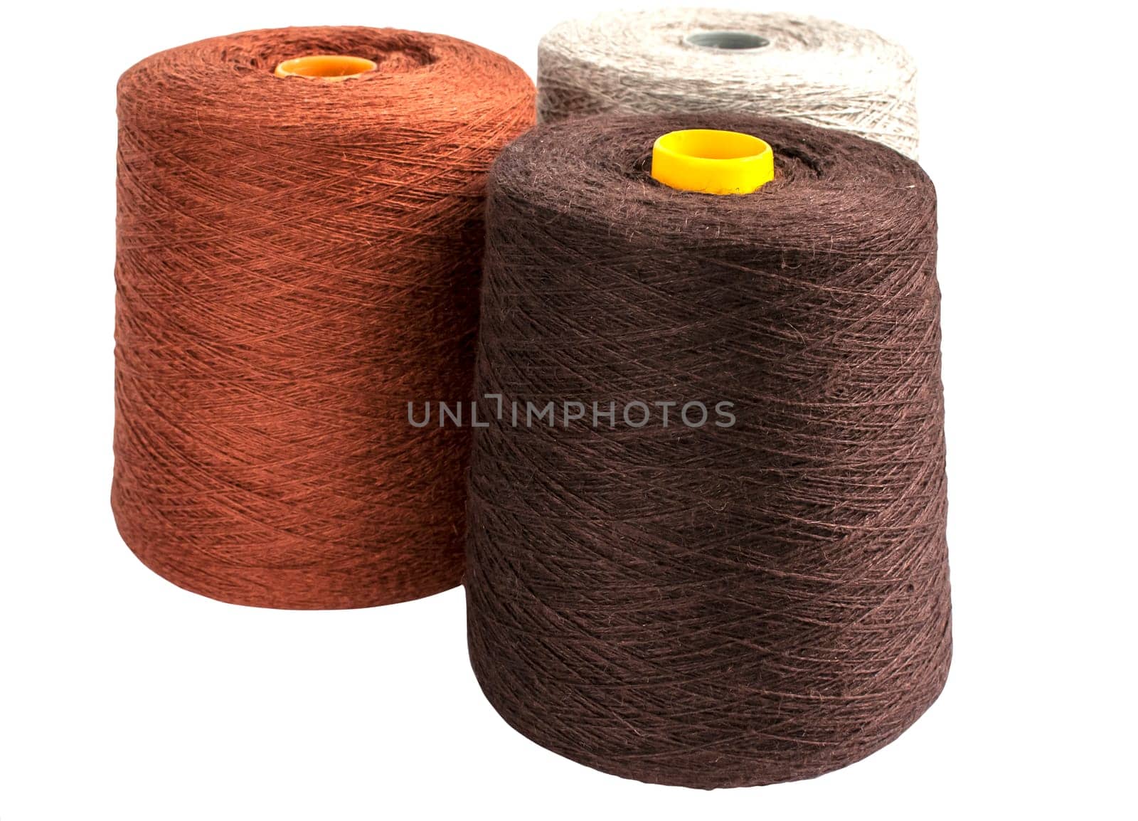 Coils with linen yarn isolated on white background