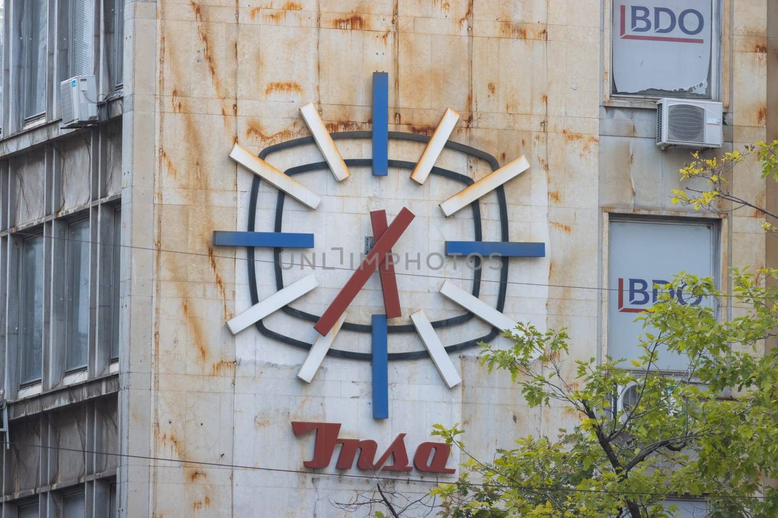 29 september 2023, Belgrade, Serbia - Wall clock - old stylish serbian construction by Studia72