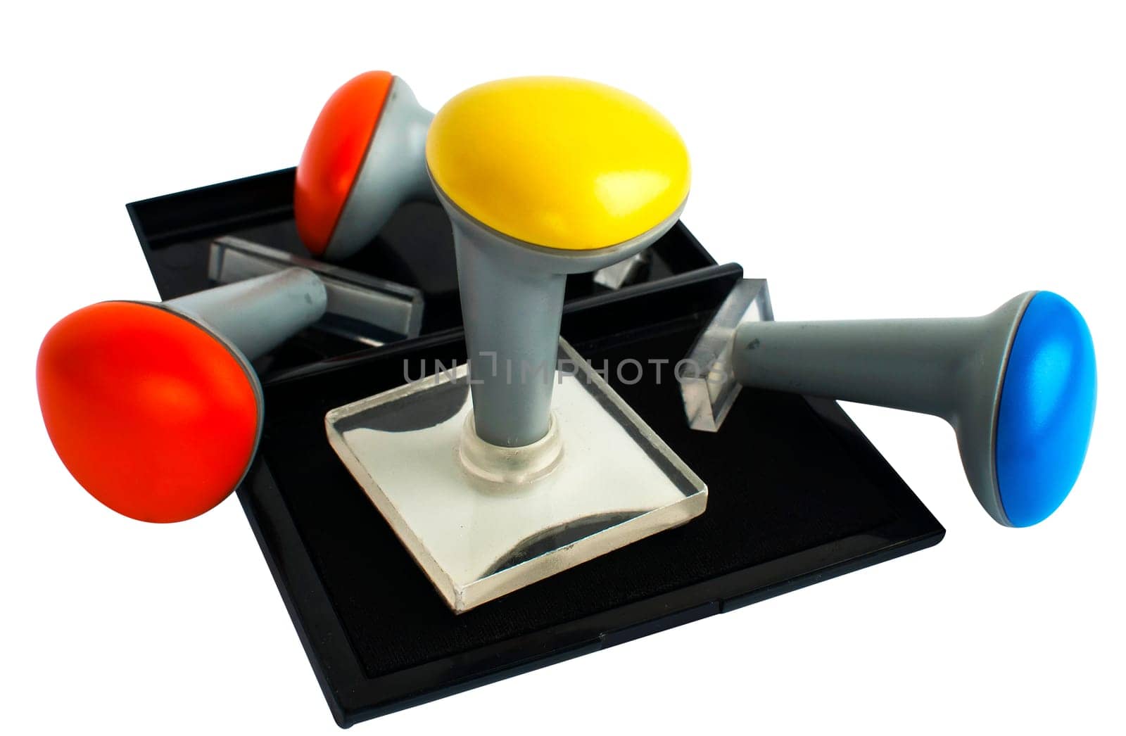 Plastic rubber stamps and inkpad isolated on white backgound