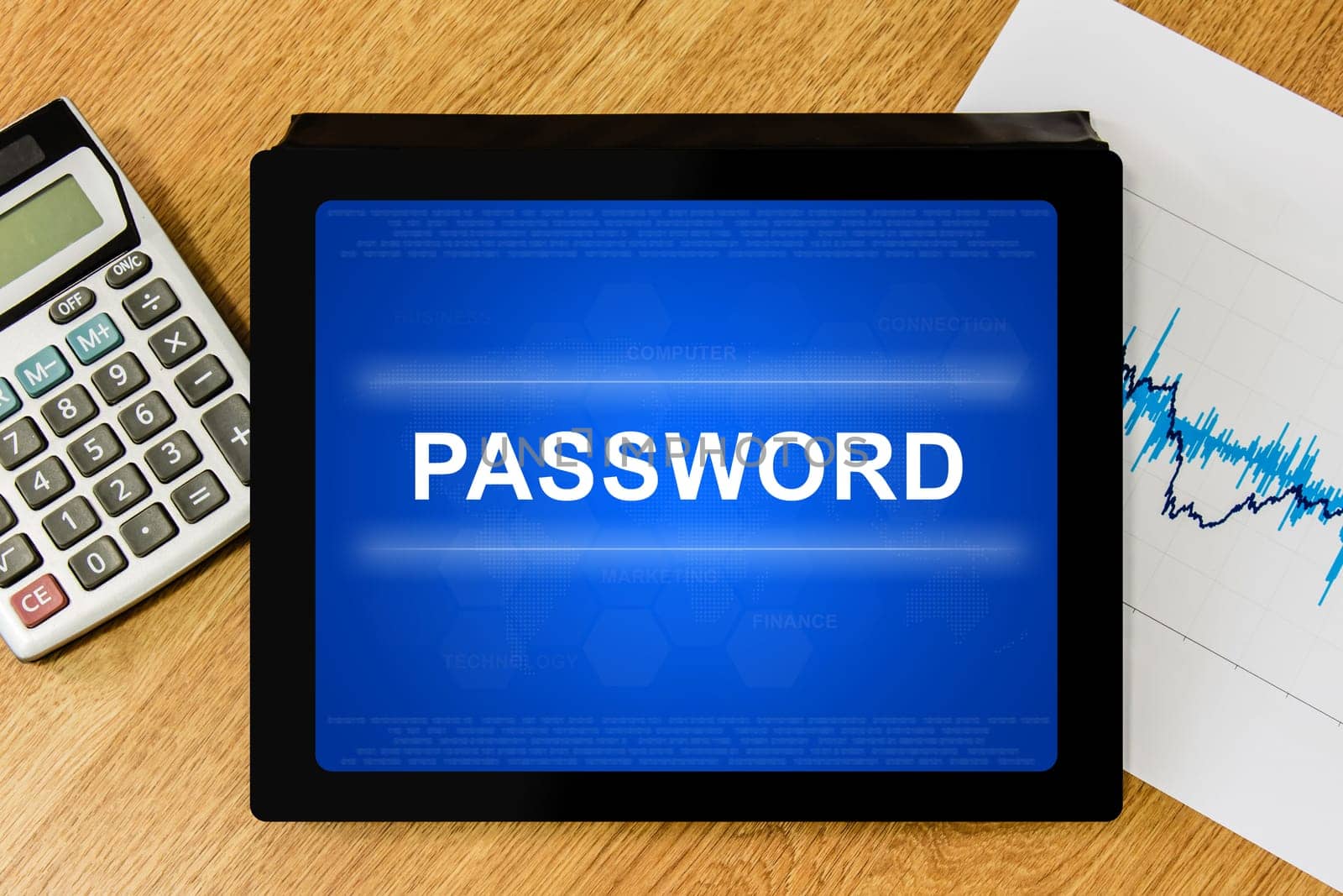 password on digital tablet with calculator and financial graph