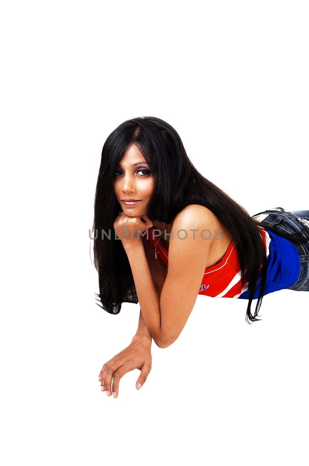 A young Hispanic woman with long black hair lying on the floor .isolated for white background..