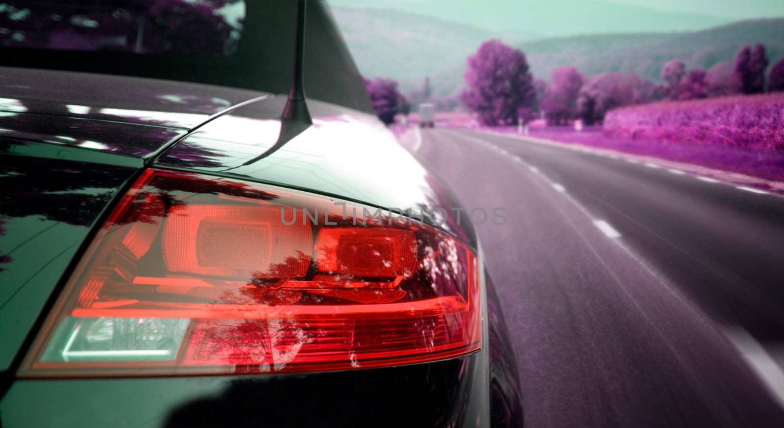 Car viewed from the back on the highway