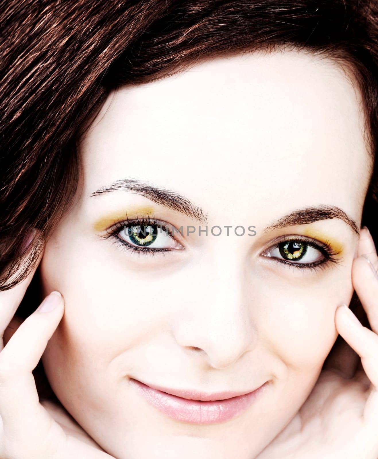 Beautiful happy woman with green eyes.