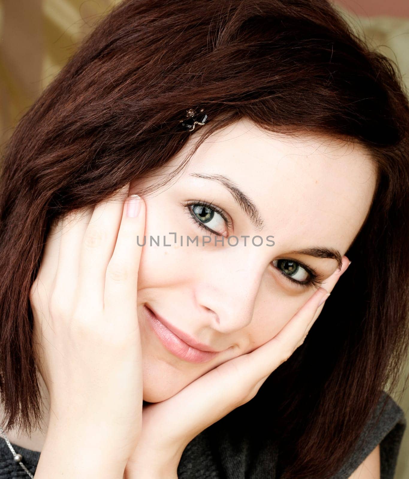 Beautiful happy woman with green eyes.