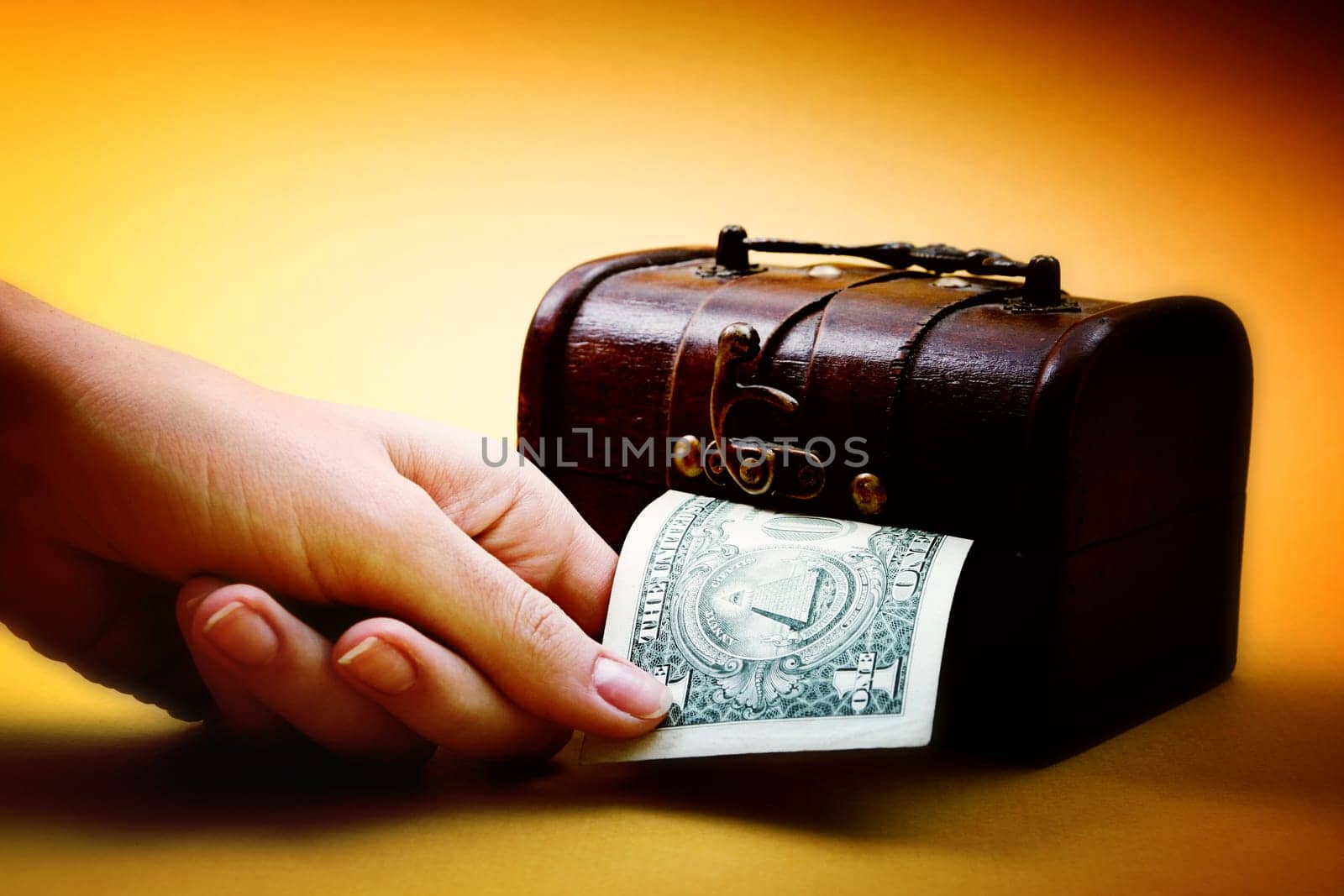Wood cashbox isolated on yellow