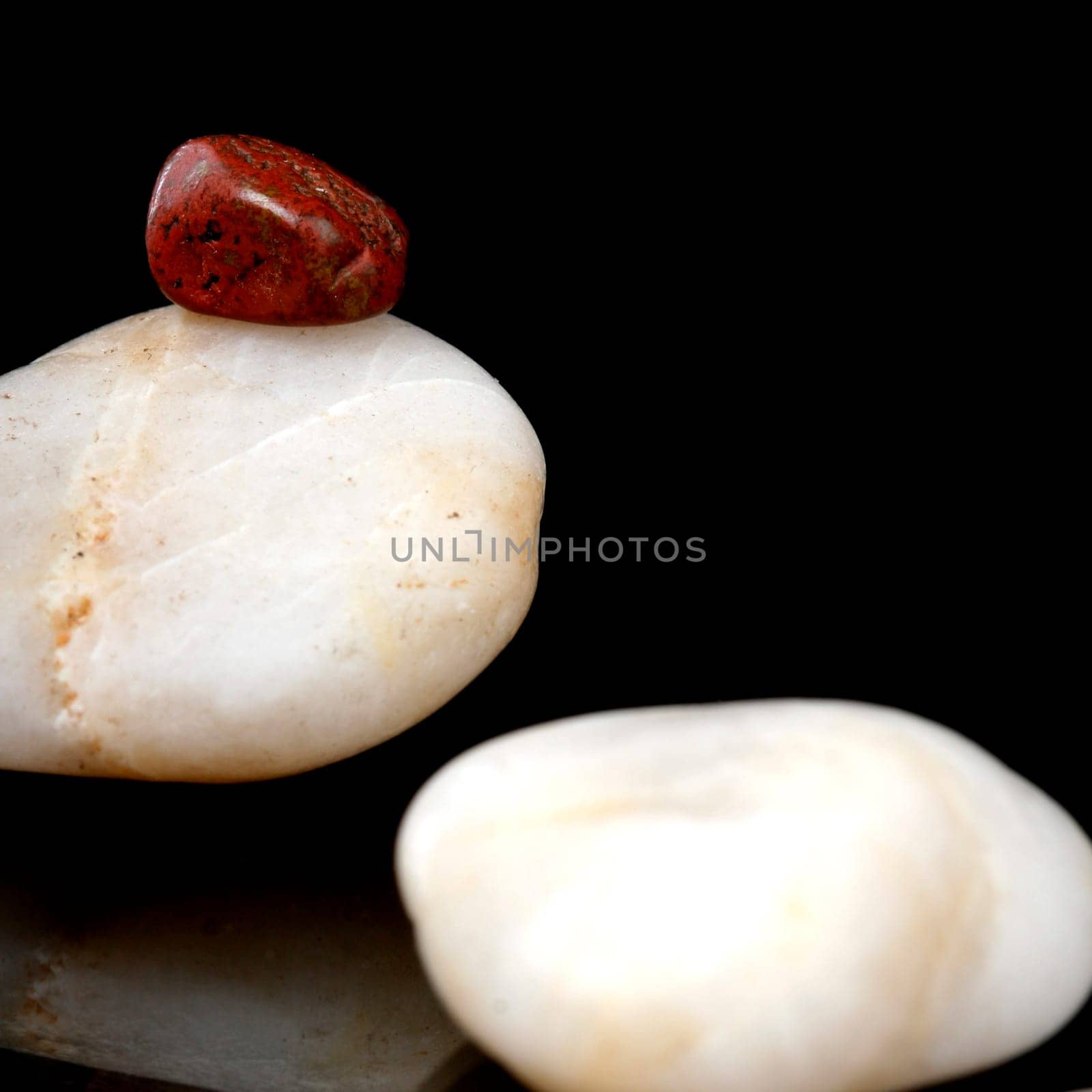 Concept made by many rocks isolated on black.