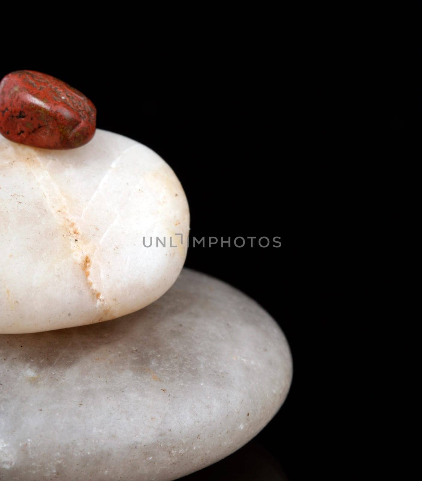 Concept made by many rocks isolated on black.