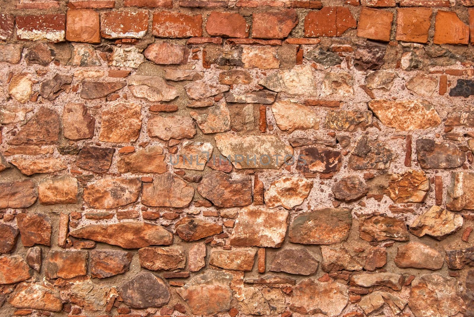 Old church stonewall closeup as background