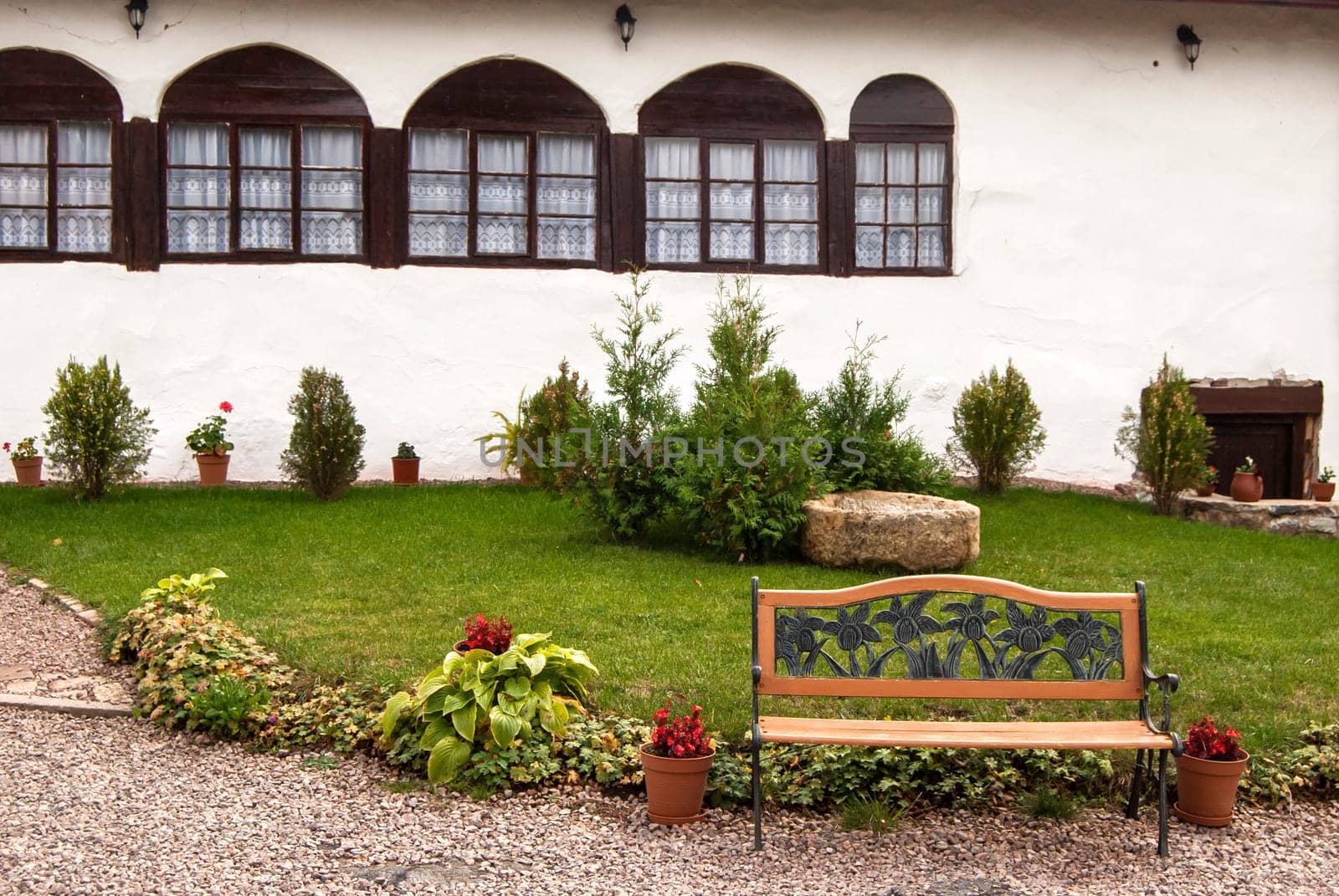 Part of orthodox monastery courtyard with bench