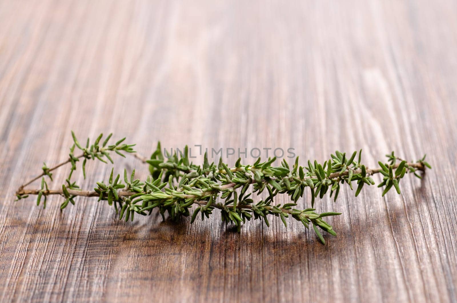 Thyme on a wooden board